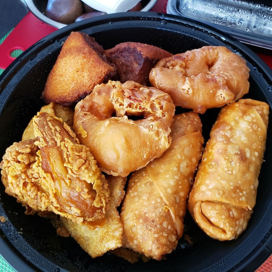 Appetizer combo with egg rolls, wontons and fried chicken